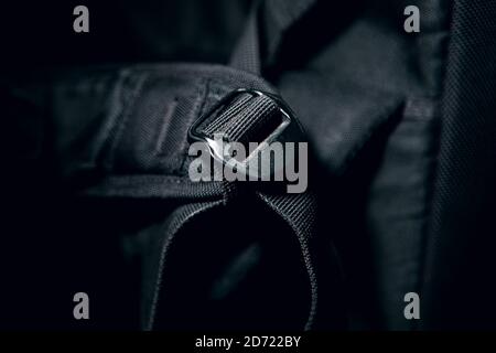Black Backpack Strap at dark Background Stock Photo