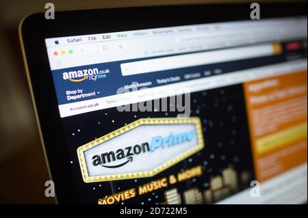 The Amazon web site pictured with with delivery boxes. The company is facing further scrutiny of its tax affairs following the EU ruling on Apple's corporation tax in Ireland. Picture date: Wednesday August 31, 2016. Photo credit should read: Matt Crossick/ EMPICS Entertainment. Stock Photo