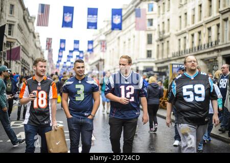 American Football fans pictured during NFL on Regent Street, in central London. The fan event saw the street closed to traffic, to promote the International Series game at Wembley between the Indianapolis Colts and Jacksonville Jaguars taking place tomorrow. Picture date: Saturday October 1, 2016. Photo credit should read: Matt Crossick/ EMPICS Entertainment. Stock Photo