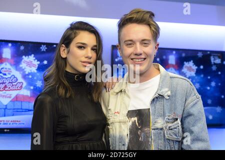 Dua Lipa is interviewed by Roman Kemp backstage during Capital's Jingle Bell Ball with Coca-Cola at London's O2 arena. Picture date: Saturday December 3rd, 2016. Photo credit should read: Matt Crossick/ EMPICS Entertainment. Stock Photo