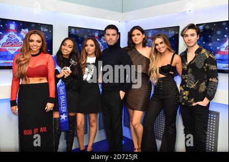Little Mix are interviewed by the Capital Breakfast presenters backstage during Capital's Jingle Bell Ball with Coca-Cola at London's O2 arena. Picture date: Saturday December 3rd, 2016. Photo credit should read: Matt Crossick/ EMPICS Entertainment. Stock Photo