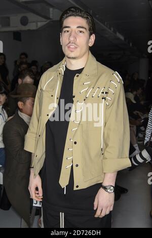 Hector Bellerin wears a Neil Barrett jacket, Zimmermann pyjamas