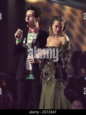 Nick Grimshaw and Rita Ora on stage at the BRIT Awards 2017, held at The O2 Arena, in London.  Picture date Tuesday February 22, 2017. Picture credit should read Matt Crossick/ EMPICS Entertainment. Editorial Use Only - No Merchandise. Stock Photo