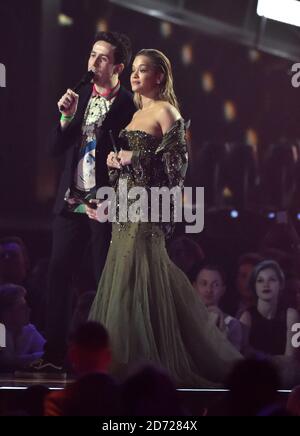 Nick Grimshaw and Rita Ora on stage at the BRIT Awards 2017, held at The O2 Arena, in London.    Picture date Tuesday February 22, 2017. Picture credit should read Matt Crossick/ EMPICS Entertainment. Editorial Use Only - No Merchandise. Stock Photo