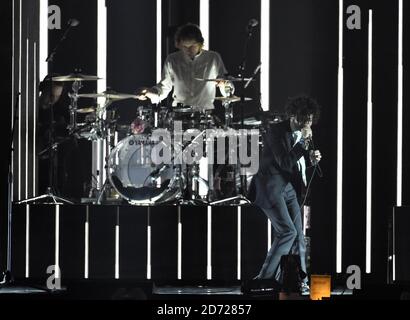 The 1975 on stage at the BRIT Awards 2017, held at The O2 Arena, in London.    Picture date Tuesday February 22, 2017. Picture credit should read Matt Crossick/ EMPICS Entertainment. Editorial Use Only - No Merchandise. Stock Photo