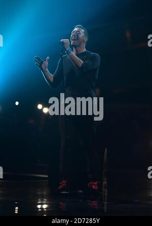 Chris Martin during the George Michael tribute on stage at the BRIT Awards 2017, held at The O2 Arena, in London.    Picture date Tuesday February 22, 2017. Picture credit should read Matt Crossick/ EMPICS Entertainment. Editorial Use Only - No Merchandise. Stock Photo