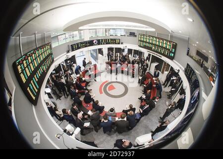 Traders pictured during an open outcry trading session, in 'The Ring' at the London Metal Exchange in London. Picture date: Tuesday March 15th, 2016. Photo credit should read: Matt Crossick/ EMPICS. The LME, the world's biggest market for base metals, is the only financial exchange in Europe to still use open outcry trading, where contracts are traded in intense 5-minute bursts. Stock Photo