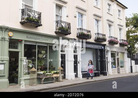 A row of shops in Kensington, London. The borough of Kensington and Chelsea is one of the most polarised in Great Britain, with some of the most expensive real estate in the UK just a short walk from several of the most deprived wards in the country - including the area around the Grenfell Tower. Picture date: Wednesday July 12th, 2017. Photo credit should read: Matt Crossick/ EMPICS Entertainment. Stock Photo