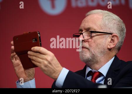 Labour leader Jeremy Corbyn takes a photo during during the Labour Party conference in Brighton. Picture date: Tuesday September 26th, 2017. Photo credit should read: Matt Crossick/ EMPICS Entertainment. Stock Photo