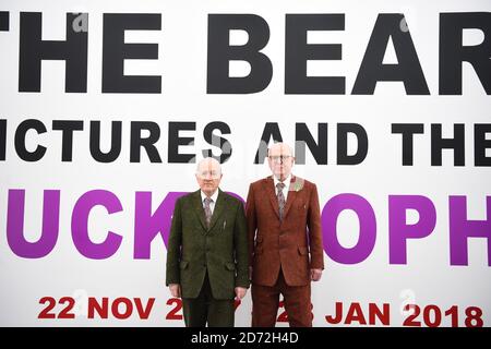 Artists Gilbert and George (full names Gilbert Proesch,left and George Passmore, right) pictured at the White Cube Bermondsey art gallery in south London, at the launch of their exhibition The Beard Pictures and their Fuckosophy. Picture date: Tuesday November 21st, 2017. Photo credit should read: Matt Crossick/ EMPICS Entertainment. The Exhibition runs from 22 November 2017 to 28 January 2018.  Stock Photo