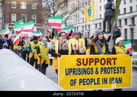 Members of the Anglo-Iranian community hold a rally opposite Downing Street, London, in solidarity with the nationwide anti-regime protests currently taking place in Iran. The protesters called on the British government to support the campaign for democratic change in Iran. Picture date: Thursday January 4th, 2018. Photo credit should read: Matt Crossick/ EMPICS Entertainment. Stock Photo