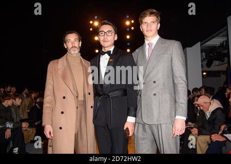 Richard Biedul, Hu Bing and Toby Huntington-Whiteley on the front row during the John Lawrence Sullivan London Fashion Week Men's AW18 show, held at BFC Show Space, London. Picture date: Saturday January 6th, 2018. Photo credit should read: Matt Crossick/ EMPICS Entertainment. Stock Photo