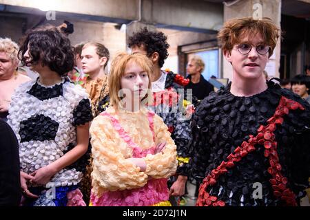 Models prepare backstage during the MAN London Fashion Week Men's AW18 show, held at the Old Selfridge's Hotel, London. Picture date: Sunday January 7th, 2018. Photo credit should read: Matt Crossick/ EMPICS Entertainment. Stock Photo