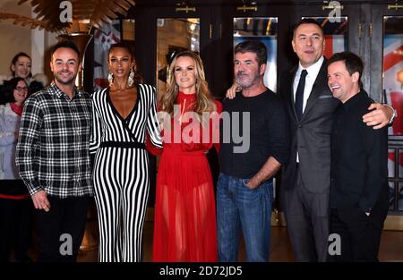 Judges Amanda Holden (centre), Alesha Dixon (second from left), David Walliams (second from right) and Simon Cowell with presenters Anthony 'Ant' McPartlin (left) and Declan 'Dec' Donnelly (right) attending the Britain's Got Talent auditions at the Blackpool Opera House Stock Photo