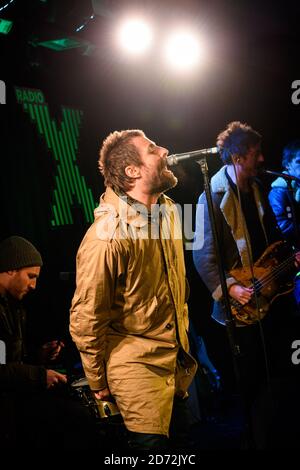 Liam Gallagher plays an intimate gig for Radio X listeners, on the roof of their studios in Leicester Square, London. The gig, with a crowd of just 90 people, was in support of Radio Xâ€™s charity, Globalâ€™s Make Some Noise. Picture date: Monday February 12th, 2018. Photo credit should read: Matt Crossick/ EMPICS Entertainment. EDITORIAL USE ONLY Stock Photo