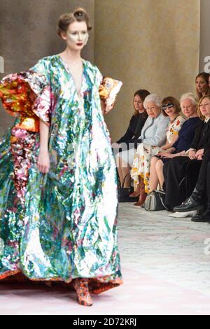 Queen Elizabeth II, sitting next to Anna Wintour, watches models on the catwalk during the Richard Quinn London Fashion Week show, held at the BFC showspace, London. Picture date: Tuesday February 20th 2018. Photo credit should read: Matt Crossick/ EMPICS Entertainment. Stock Photo