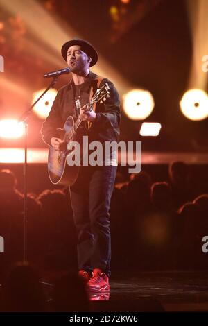 EDITORIAL USE ONLY.  Justin Timberlake performs on stage at the Brit Awards at the O2 Arena, London. Stock Photo
