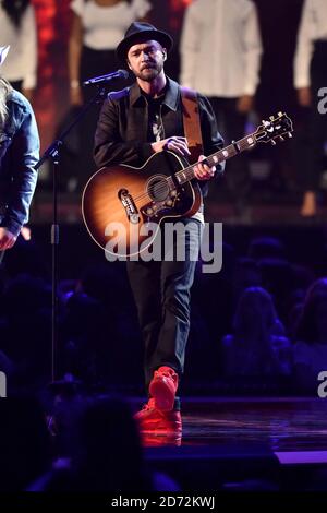 EDITORIAL USE ONLY.  Justin Timberlake performs on stage at the Brit Awards at the O2 Arena, London. Stock Photo