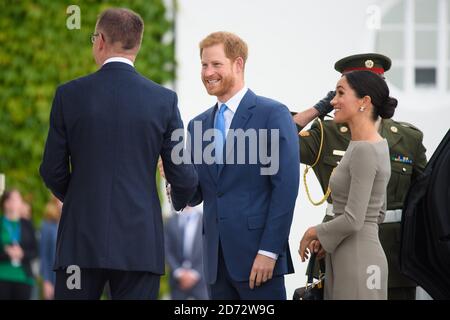 Prince Harry and Meghan Markle, the Duke and Duchess of Sussex, arriving at Aras an Uachtarain in Dublin, where they met the President of Ireland, Michael Higgins, on the second day of the Royal couple's visit to Dublin, Ireland. Picture date: Wednesday July 11th, 2018. Photo credit should read: Matt Crossick/ EMPICS Entertainment. Stock Photo