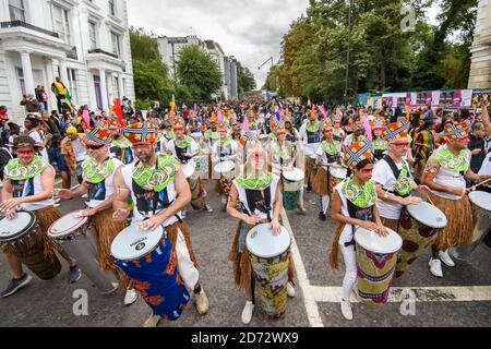 Dancers and drummers on the parade route during the second day of the Notting Hill Carnival in London. Picture date: Monday August 27th, 2018. Photo credit should read: Matt Crossick/ EMPICS Entertainment. Stock Photo
