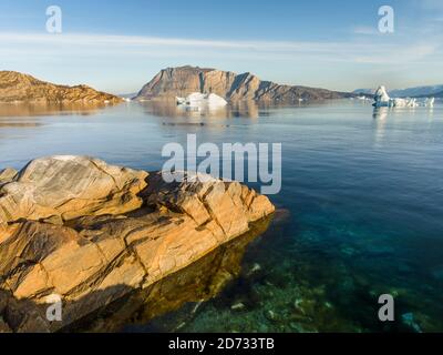 Landscape with icebergs in the  Uummannaq fjord system in the north of west greenland.  America, North America, Greenland, Denmark Stock Photo
