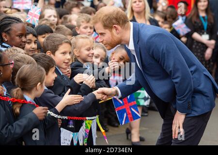 The Duke of Sussex meets schoolchildren after a Queen's commonwealth canopy and woodland tree planting, at St Vincentâ€™s Catholic Primary School in west London. Picture date: Wednesday March 20, 2019. Photo credit should read: Matt Crossick/Empics Stock Photo