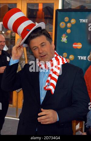 Actor Alec Baldwin tips his 'Cat in the Hat' hat to fans at the film premiere of 'Dr. Seuss' The Cat in the Hat'.  Baldwin amused fans by playing with his hat and scarf as he moved along the red carpet. La, Ca, 11/9/03   [[dab]] Stock Photo