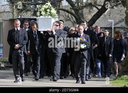 Jade Goody's coffin is carried into the church of St John the Baptist in Buckhurst Hill, Essex, for her funeral service. Stock Photo