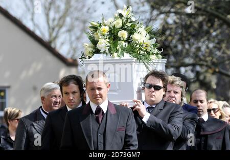 Jade Goody's coffin is carried into the church of St John the Baptist in Buckhurst Hill, Essex, for her funeral service. Stock Photo