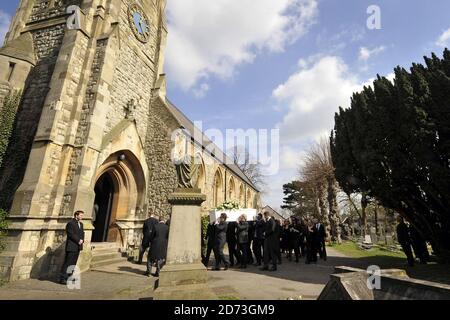 Jade Goody's coffin is carried into the church of St John the Baptist in Buckhurst Hill, Essex, for her funeral service. Stock Photo