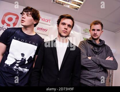 The White Lies (l-r Jack Lawrence-Brown, Harry McVeigh, Charles Cave) pose for photographs before perfoming a live session at XFM, at the Global Radio studios in central London. Picture date: 21 May 2009. Stock Photo