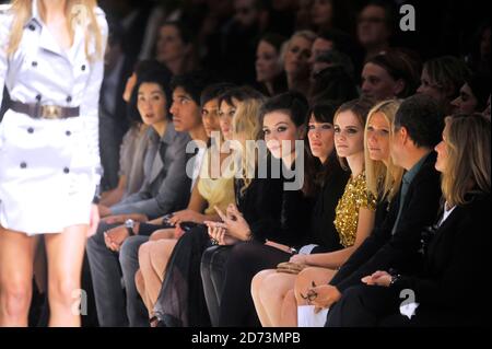 Daisy Lowe, Liv Tyler, Emma Watson, Gwyneth Paltrow and Mario Testino attending the Burberry fashion show, held at the Chelsea College of Art and Design in central London as part of London Fashion Week. Stock Photo