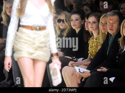 Daisy Lowe, Liv Tyler, Emma Watson, Gwyneth Paltrow and Mario Testino attending the Burberry fashion show, held at the Chelsea College of Art and Design in central London as part of London Fashion Week. Stock Photo