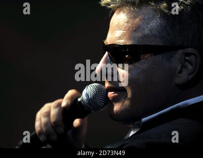 Suggs of Madness performing live on Regent Street, central London, to celebrate Absolute RadioÕs 1st birthday as part of the Regent Street Festival. Stock Photo