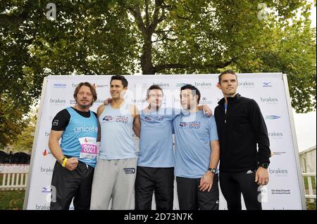 (l-r) Charley Boorman, Jeremy Edwards, Greg Burns, Antony Costa and Matt Roberts seen at the start of the Royal Parks FOundation Half Marathon, in Hyde Park in central London Stock Photo