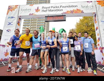 (l-r) Gary Webster, Ben Fogle, Charley Boorman, Nell McAndrew, Matt Roberts, Rachel Christie, Jacskon Williams, Tom Aikens, Jeremy Edwards, Rani Price, Greg Burns and Antony Costa on the start line of the Royal Parks FOundation Half Marathon, in Hyde Park in central London Stock Photo