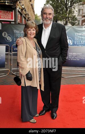 John Alderton and Pauline Collins arrive at the premiere of From Time ...