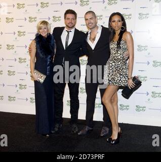Lisa Duffy, Keith Duffy, Shane Lynch and wife Sheena Lynch arrive at the Emeralds and Ivy Ball in aid of Cancer Research UK held at Battersea Evolution in south London Stock Photo