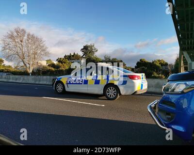 AUCKLAND, NEW ZEALAND - Jul 04, 2019: Auckland / New Zealand - July 4 2019: View of Police Holden Commodore car at motorway