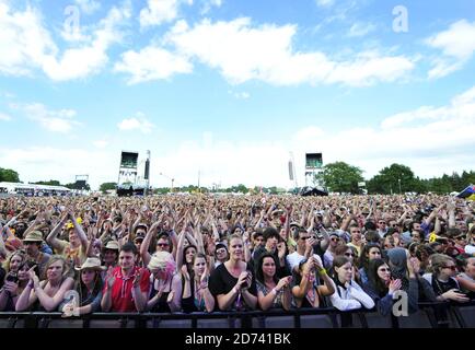 The crowd watch Crowded House at the Isle of Wight festival, in Newport on the Isle of Wight. Picture date: 12 June 2010. Stock Photo