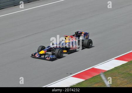 SEPANG, MALAYSIA - APRIL 2 : Red Bull Racing driver Sebastian Vettel of Germany drives during the first practice session at the Sepang F1 circuit Apri Stock Photo