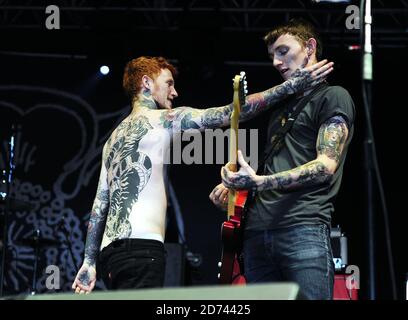 Frank Carter of Gallows performing at the Leeds Festival, as the band take to the stage for a secret set under the name 'Rats', in Bramham Park in West Yorkshire.  Stock Photo
