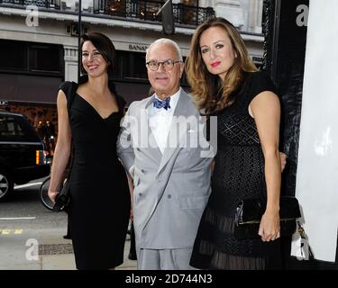 (l-r) Christina Blahnik, Manolo Blahnik, and Lucy Yeomans attending the The World Of Manolo Launch Party, at Liberty in central London.  Stock Photo