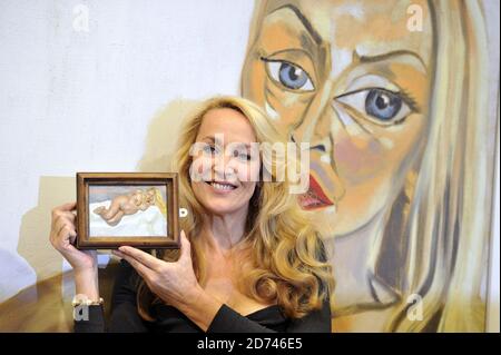 Jerry Hall pictured with Lucian Freud's Eight Months Gone, at an ...