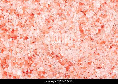 Himalayan pink salt background. Himalayan pink salt in crystals. Stock Photo