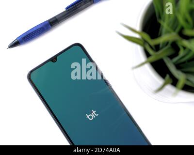 Lod, Israel - July 8, 2020: Bit app launch screen with logo on a white background. Close up top view flat lay. Stock Photo