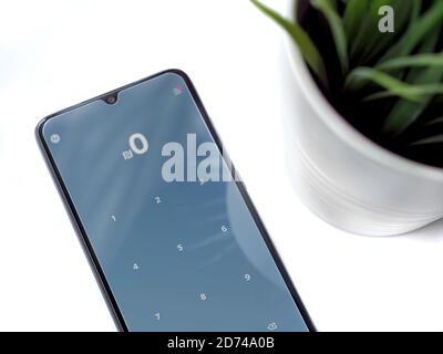 Lod, Israel - July 8, 2020: PAY app launch screen with logo on a white background. Close up top view flat lay. Stock Photo
