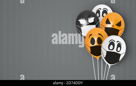 Colored balloons with faces in medical mask for Halloween party on dark background. Space for text. Happy holiday October 31. Halloween celebration Stock Photo
