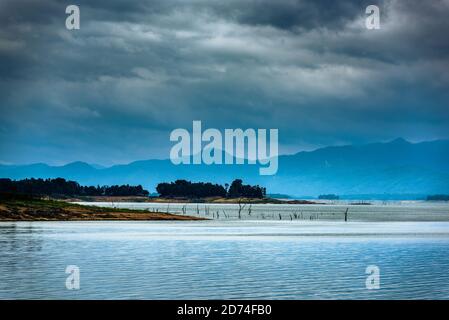 Mystical light in the early morning at dam thailand. Landscape Stock Photo