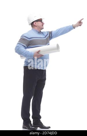 side view. a man with a roll of drawings looking somewhere ahead. Stock Photo